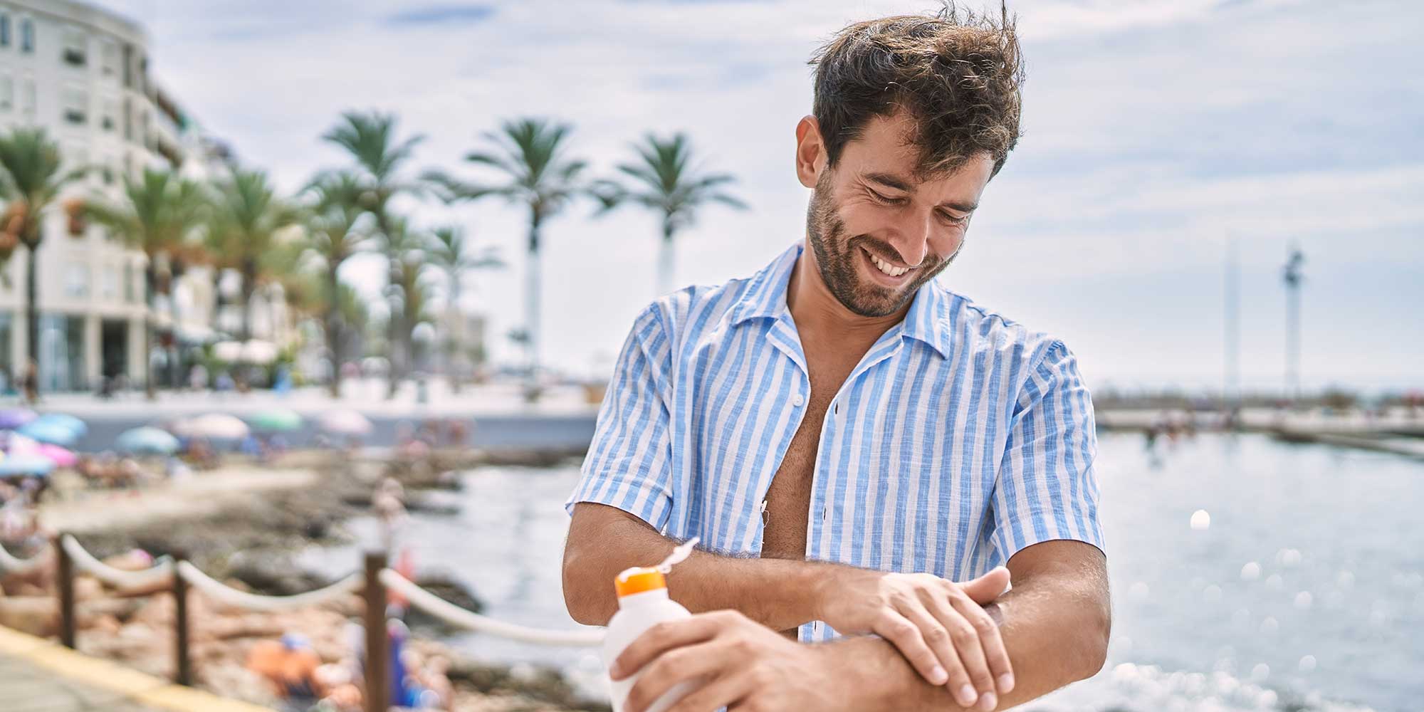 Man applying sun cream